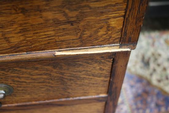 An Edwardian oak pedestal desk W.153cm